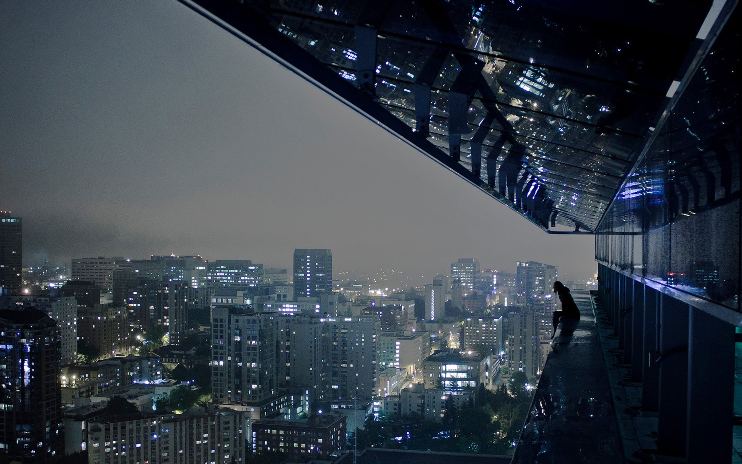 Tomt Wallpaper Image Girl On Ledge Of Building Looking Over A City In The Nighttime